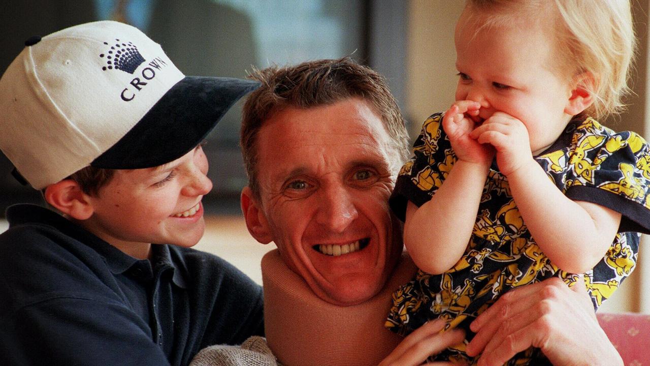 20/12/1998:  Jockey Greg Hall with his two children, Nicholas and Kassy at their East Malvern home.  p/ /horseracing