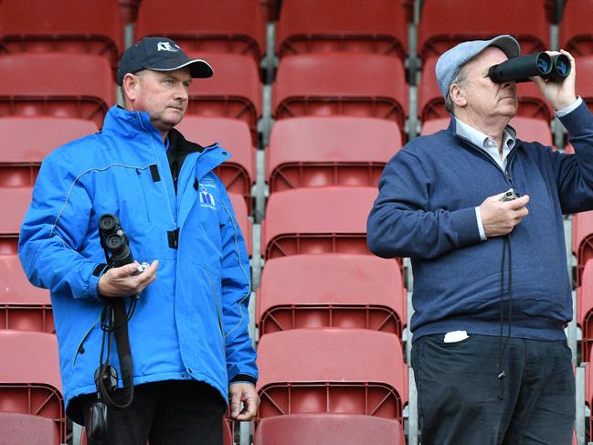 Trainer's Toby Edmonds and Robert Smerdon are seen clocking their horses during a trackwork Session at Moonee Valley Racecourse on September 25, 2017 in Melbourne, Australia. (Photo by Vince Caligiuri/Getty Images)