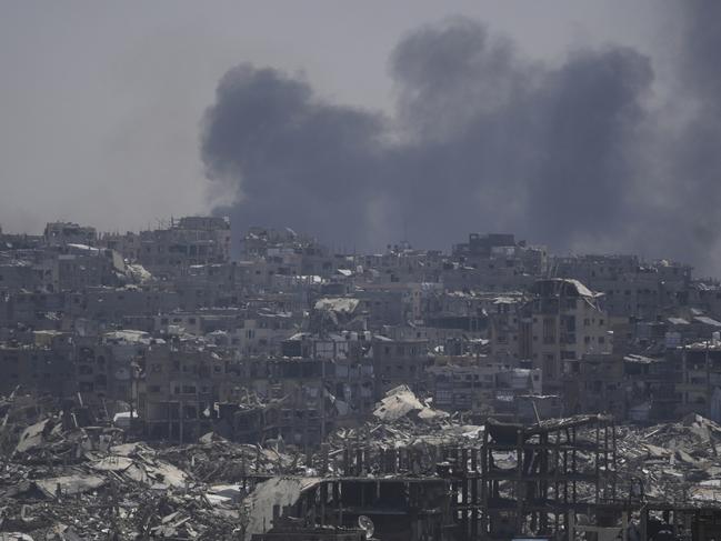 Smoke rises following an Israeli air strike near Jabalia, northern Gaza Strip, on Friday. Picture: AP