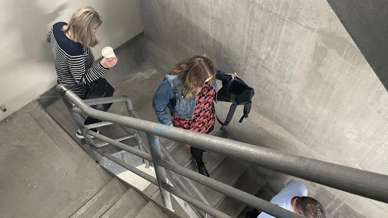 People evacuate a building in Southbank after the tremor was felt.