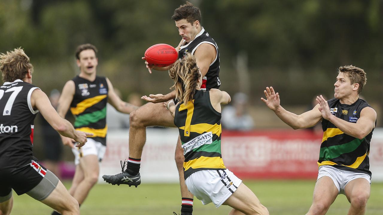 MPNFL: Bonbeach’s Lachlan Gill-Renouf under pressure from Jai Taylor<br/> of Dromana. Picture: Valeriu Campan