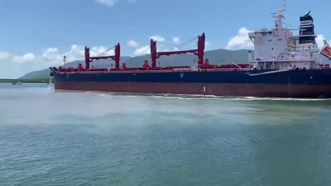 Bulk carrier churns up mud in Trinity Inlet