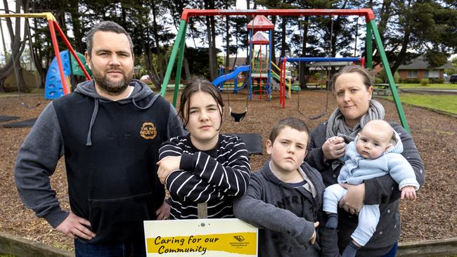 Fergus and Kate Allen with their children Lola, 11, Harvey, 9, and Cooper, 4 months, at their local playground in Mornington. Picture: David Geraghty