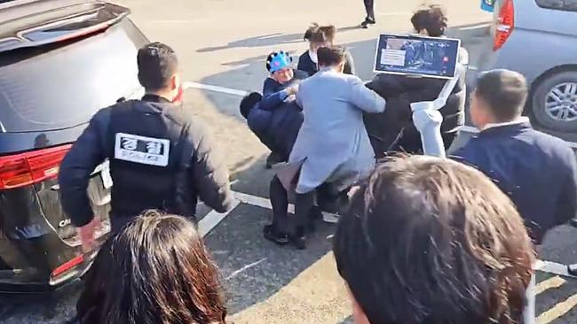 South Korea's opposition party leader Lee Jae-myung was stabbed during a visit to Busan, South Korea, last year.