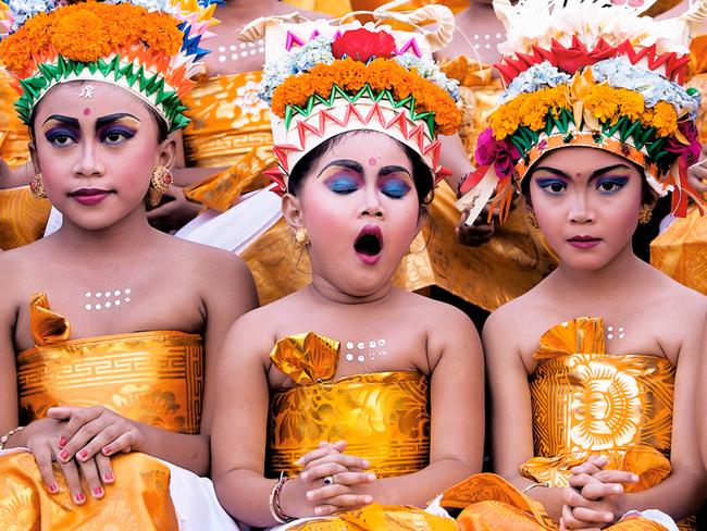 Shortlist for Sony World Photography Awards 2016 Image Name: Too much practice Photographer Name: Khairel Anuar Che Ani Year: 2016 Image Description: Image was taken in Bali during Melasti Festival. This Festival is conducted once a year in conjunction with Nyepi or Silent Day. These young girls were waiting for their turn to perform. They looked stunning with their bright coloured costumes and heavy make-up on, however the expression on each of the girls' face especially the yawning girl gives this image an extra 'ummpph'. Series Name: Series Description: Copyright: Khairel Anuar Che Ani, Malaysia, Shortlisted, Open Competition, Split Second, 2016 Sony World Photography Awards