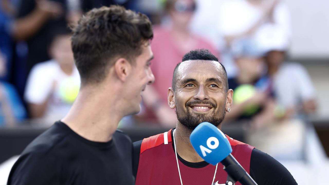 MELBOURNE, AUSTRALIA - JANUARY 25: Thanasi Kokkinakis of Australia and Nick Kyrgios of Australia are interviewed after winning their Men's Doubles Quarterfinals match against Tim Puetz of Germany and Michael Venus of New Zealand during day nine of the 2022 Australian Open at Melbourne Park on January 25, 2022 in Melbourne, Australia. (Photo by Darrian Traynor/Getty Images)