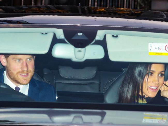 All smiles! Prince Harry and Meghan Markle pictured today, en route to Buckingham Palace for the Queen’s pre-Christmas lunch. Picture: John Rainford/WENN