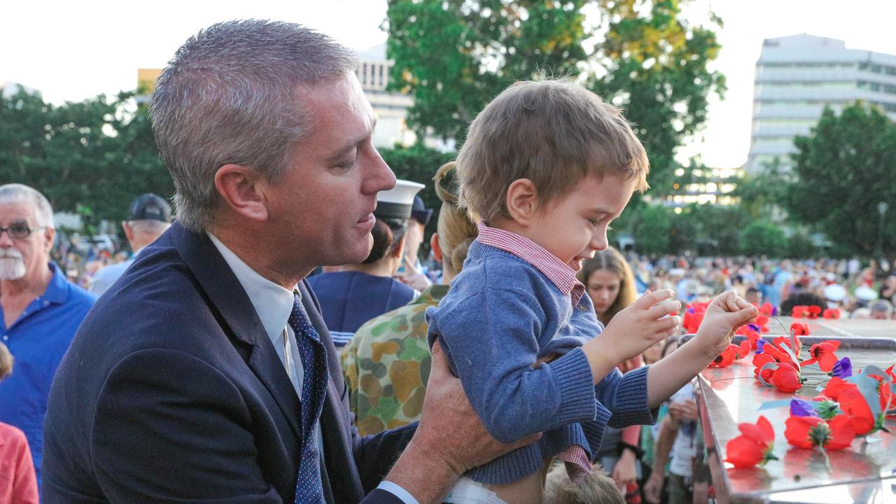 Alex Bruce and Son Ralph 3 at The Dawn Service at Darwins Cenotaph commemorating ANZAC Day 2021. Picture Glenn Campbell