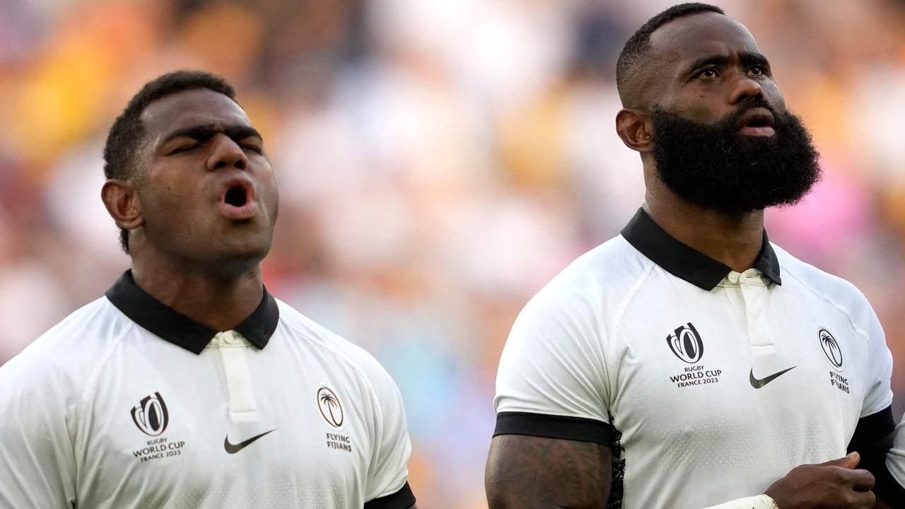 Tuisova and Semi Radradra during national anthems before the Wallabies match. Photo by Francis BOMPARD / AFP