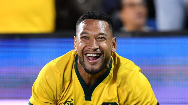 Israel Folau of the Wallabies celebrates scoring a try during the Rugby Championship match between Australia and Argentina at Cbus Super Stadium on the Gold Coast, Saturday, September 15, 2018. (AAP Image/Darren England) NO ARCHIVING, EDITORIAL USE ONLY