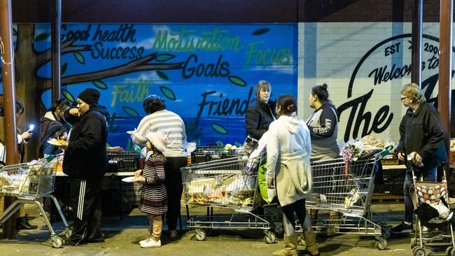 People queuing for food at the Community Cafe in Miller, NSW. Picture: Media Mode/news.com.au