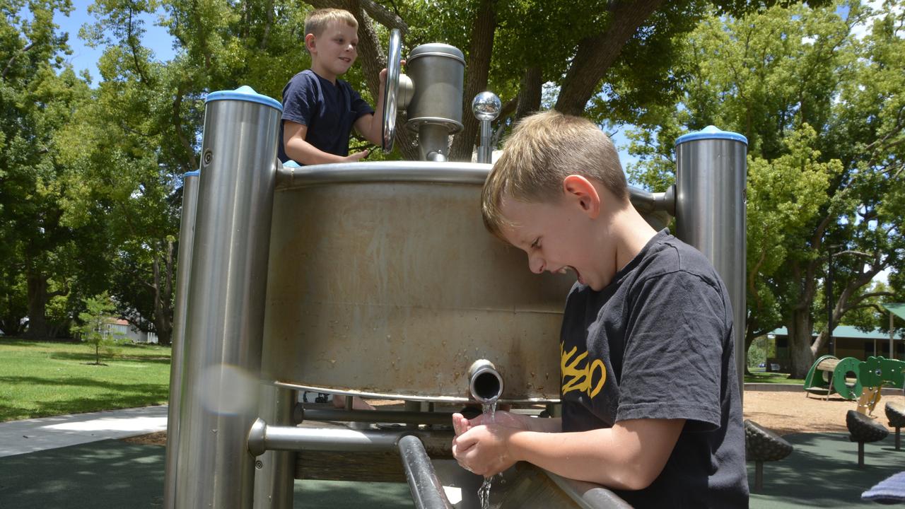 Eight-year-old twins Cooper and Hudson Knauth are loving the summer school holidays at Toowoomba's Queen's Park. Wednesday, December 29 2021. PICTURE: Morgan Burley