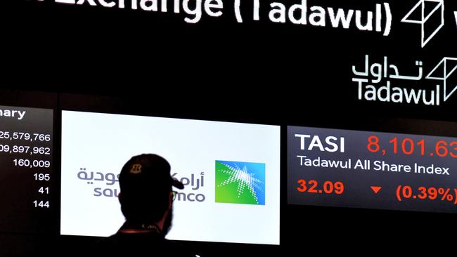 An exchange board at the Stock Exchange Market (Tadawul) bourse in Riyadh displaying Aramco shares. Picture: AFP