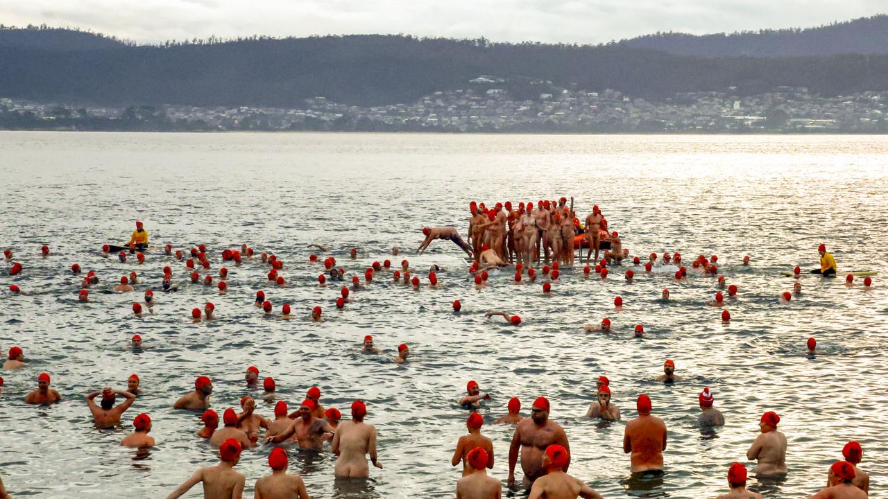 About 3000 participants dived into the very cold River Derwent, one of the signature things for winter solstice and one of the remaining iconic events of Dark Mofo. Picture: NewsWire/Minch Media