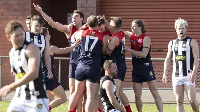 North Hobart celebrate a goal against Glenorchy at North Hobart. Picture: CHRIS KIDD