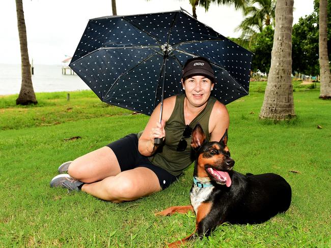 Weather Pic; North Ward resident Belinda Johnston with her dog Mickey Kelpie X 1yo enjoying a walk along the Strand.