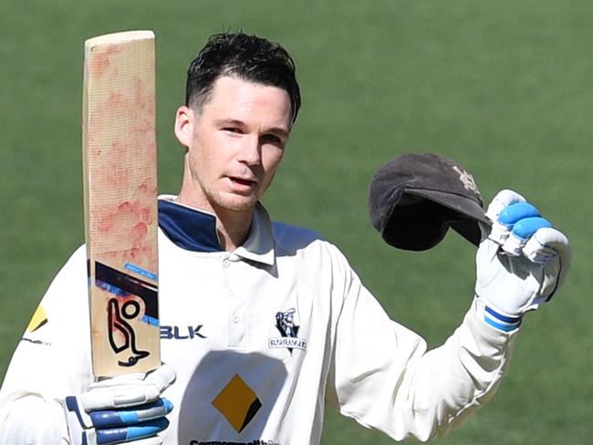 Peter Handscomb from the Bushrangers celebrates his 100 runs during day 4 of the round 6 JLT cricket match between South Australia and Victoria at the Adelaide Oval in Adelaide, Sunday, February 11, 2018. (AAP Image/David Mariuz) NO ARCHIVING, EDITORIAL USE ONLY, IMAGES TO BE USED FOR NEWS REPORTING PURPOSES ONLY, NO COMMERCIAL USE WHATSOEVER, NO USE IN BOOKS WITHOUT PRIOR WRITTEN CONSENT FROM AAP