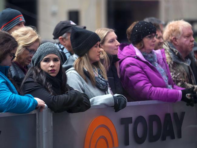 Fans watch outside of the New York set the Today show on the day Matt Lauer was axed. Picture: Drew Angerer/Getty Images/AFP