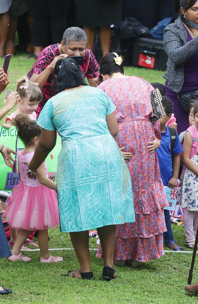 The Duchess looks in no rush to remove the young fan. Picture: Matrix