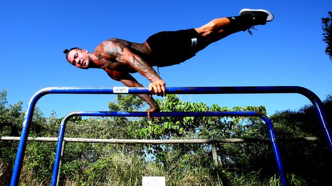 AMPM fitness guru Johann Ofner working out at Burleigh in February 2016. Picture: Kit Wise