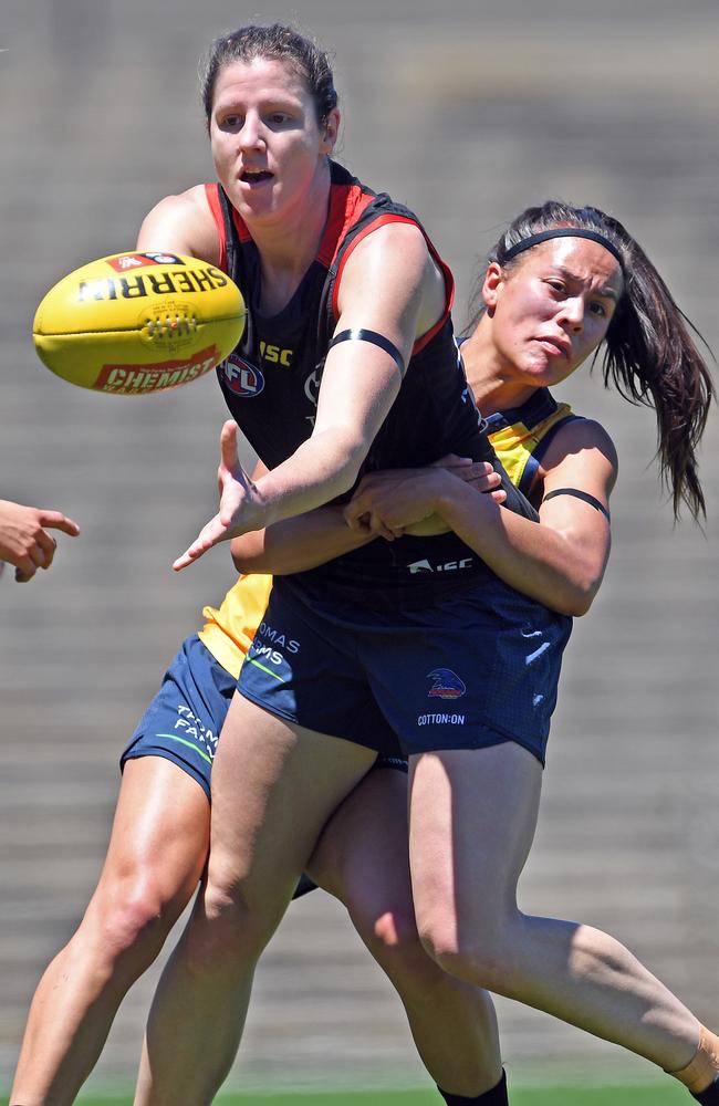 Jess Foley tackled by Justine Mules during an internal Crows AFLW practice match. Picture: Tom Huntley