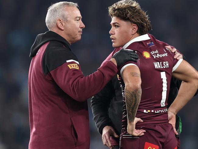 Reece Walsh is treated after being wiped out by Joseph-Aukuso Suaalii in Origin I. Picture: Cameron Spencer/Getty Images