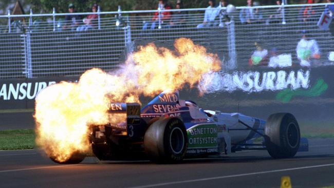 Jean Alessi's engine catches fire during a practice session on Day 3 of the 1996 Albert Park GP. Picture: William West