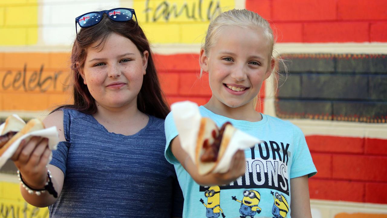 Kate and Emma at a sausage sizzle at a polling place at Prestons Public School on the day of the recent NSW state election. Picture: AAP
