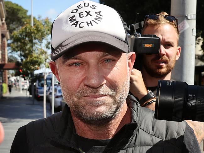 Pictured Leaving Manly Police Station in Sydney is former Australian cricketer Michael Slater who has been arrested on domestic violence charges.Picture: Richard Dobson