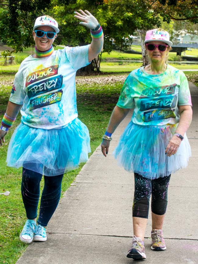 Kristy Dutton and Aileen Hunter from Walkerston at the Mackay Colour Run 2021. Picture: Michaela Harlow