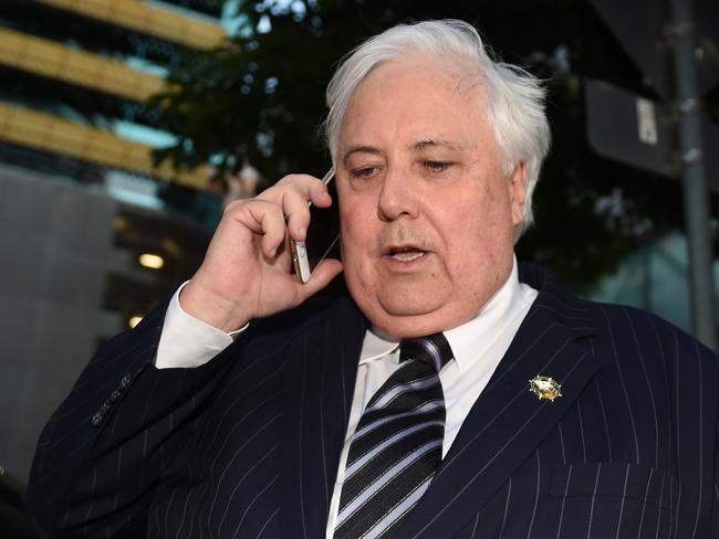 Businessman Clive Palmer leaves the Federal Court in Brisbane, Friday, Sept. 16, 2016. The former federal MP gave evidence under oath about the demise of Queensland Nickel, which was put into liquidation earlier this year. (AAP Image/Dan Peled) NO ARCHIVING