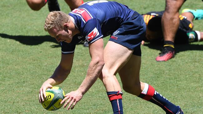 Reece Hodge scores for the Rebels against the Waikato Chiefs. Picture: AAP Image