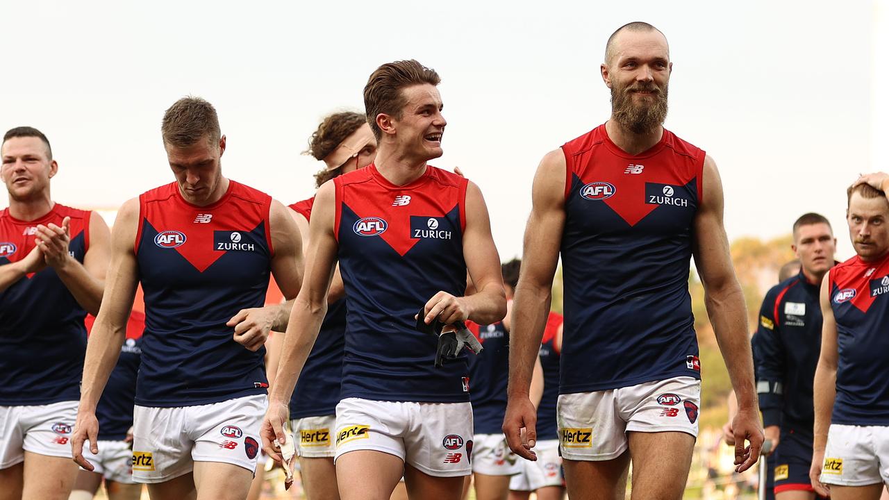 HOBART, AUSTRALIA - MAY 02: The Demons celebrate after they defeated the Kangaroos during the round seven AFL match between the North Melbourne Kangaroos and the Melbourne Demons at Blundstone Arena on May 02, 2021 in Hobart, Australia. (Photo by Robert Cianflone/Getty Images)