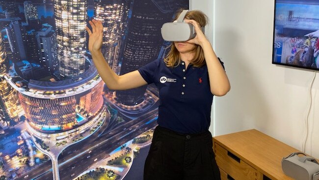 A user of the virtual reality tour at the Queen's Wharf visitors centre. Picture: Destination Brisbane Consortium