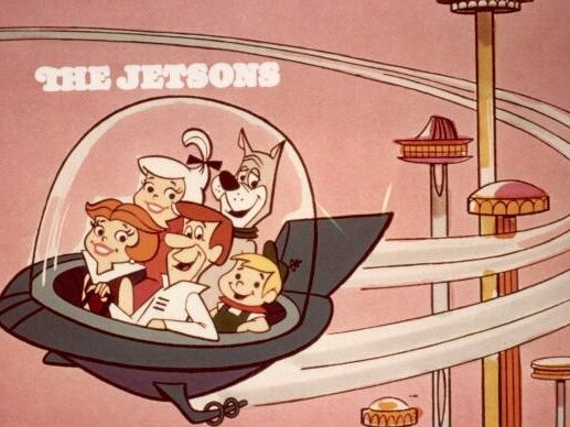 circa 1962: Cartoon family the Jetsons, comprised of George, Jane, Judy, Elroy, and Astro, flying in a space car in a space age city, in a still from the Hanna-Barbera animated television show, 'The Jetsons'. (Photo by Hulton Archive/Getty Images)