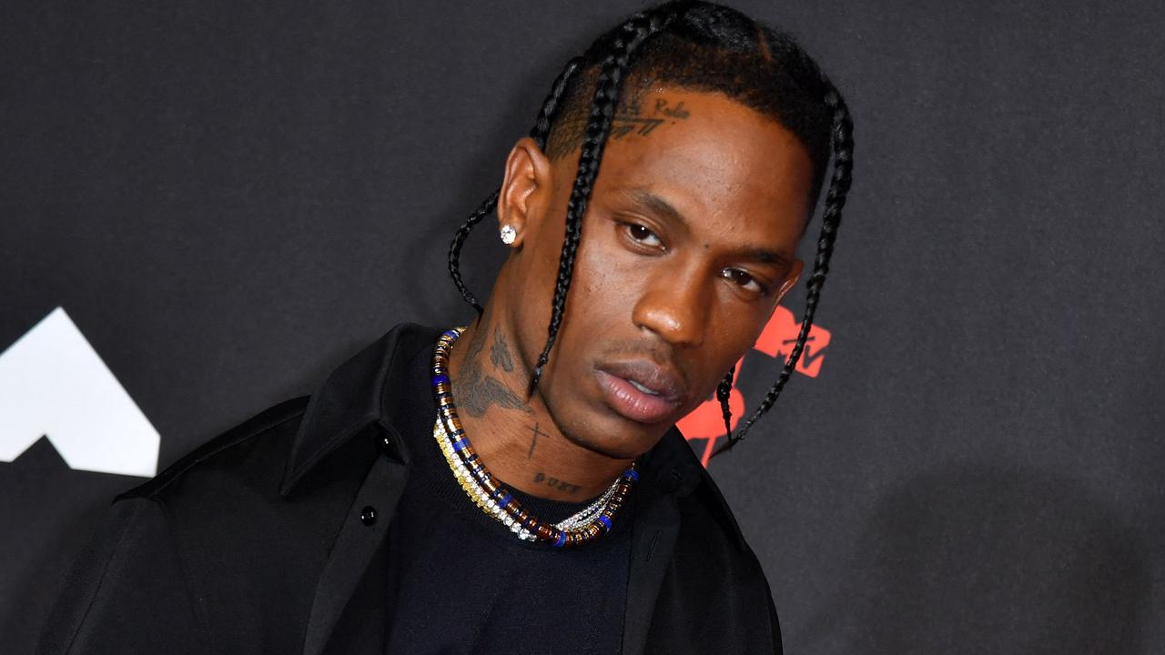 Rappers Travis Scott and Drake have been sued for "inciting mayhem" at the concert. Picture: AFP.