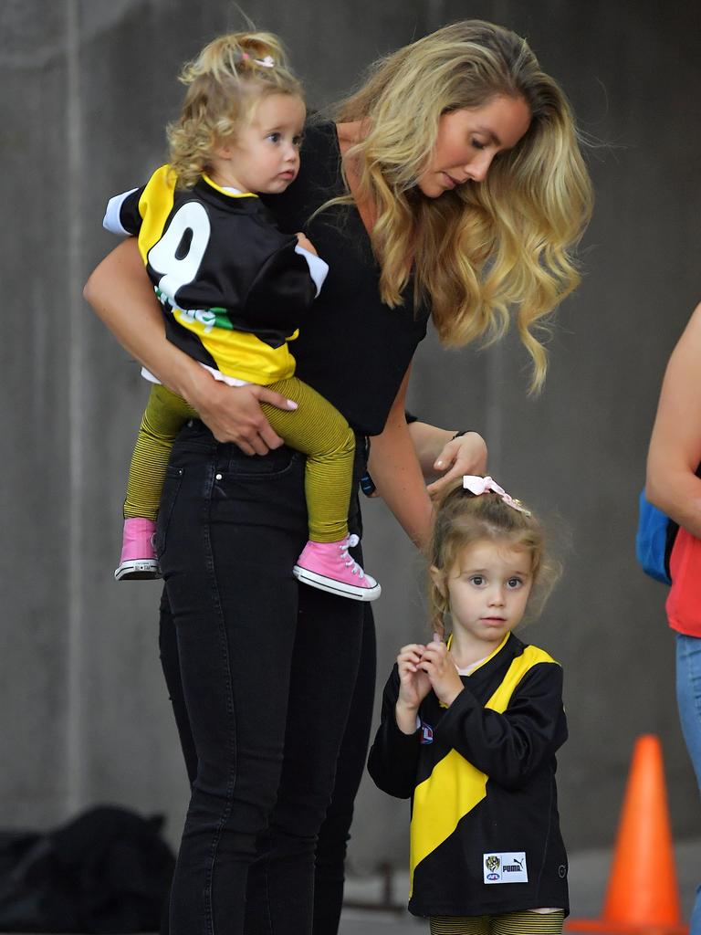 In Adelaide watching dad play against the Crows. Picture: Getty