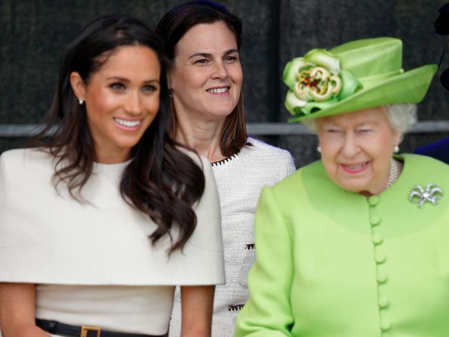 WIDNES, UNITED KINGDOM - JUNE 14: (EMBARGOED FOR PUBLICATION IN UK NEWSPAPERS UNTIL 24 HOURS AFTER CREATE DATE AND TIME) Meghan, Duchess of Sussex and Queen Elizabeth II (accompanied by Samantha Cohen) attend a ceremony to open the new Mersey Gateway Bridge on June 14, 2018 in Widnes, England. Meghan Markle married Prince Harry last month to become The Duchess of Sussex and this is her first engagement with the Queen. During the visit the pair will open a road bridge in Widnes and visit The Storyhouse and Town Hall in Chester. (Photo by Max Mumby/Indigo/Getty Images)