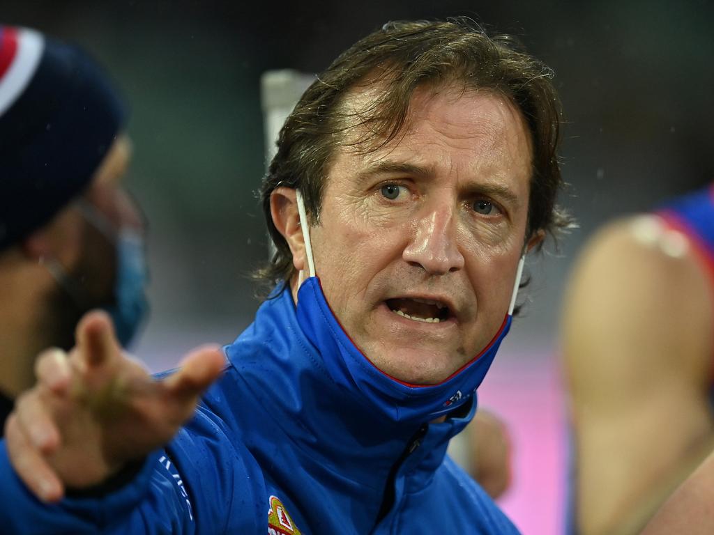 It might have wrecked his hair, but the wet weather played right into the hands of Luke Beveridge and the Dogs. Picture: AFL Photos/Getty Images