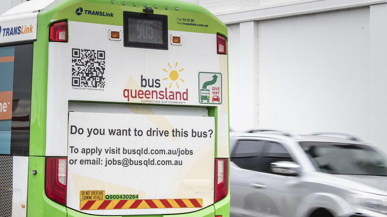 An advertisement looking for bus drivers is seen on the back of a TransLink Bus Queensland bus as it is driven on a Toowoomba CBD street. Picture: Kevin Farmer