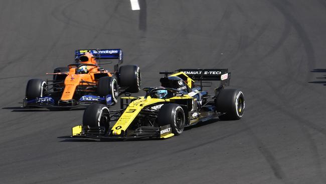 Renault’s Australian driver Daniel Ricciardo competes next to McLaren’s British driver Lando Norris during the Formula One Hungarian Grand Prix. Picture: Attila KISBENEDEK/AFP