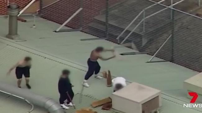 Young offenders scaled the roof at Melbourne Youth Justice Centre.