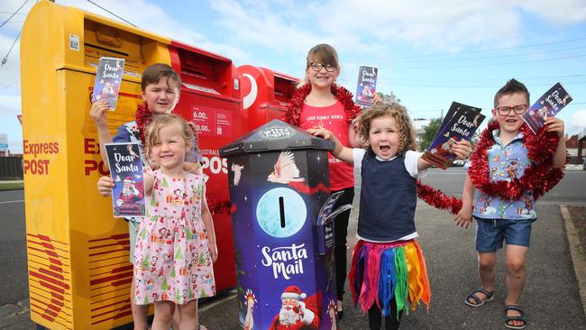 Max White, 6, Zoey White, 3, Amelia Rose, 8, Paige Bartlett, 3 and Sam White, 5. Children only have until Thursday to write and post a letter to Santa if they want to receive a message back. Picture: Peter Ristevski