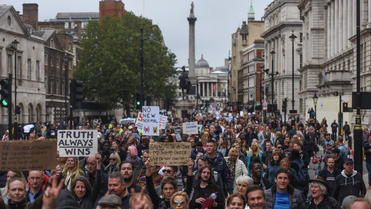 Anti-mask protesters participate in the Unite for Freedom protest outside Downing Street on August 29, 2020 in London.