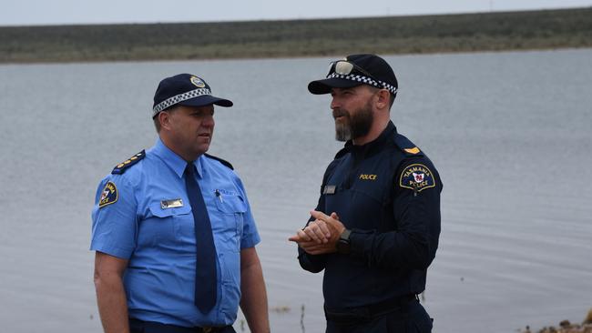 Bridgewater Division Acting Inspector Jason Klug with Sergeant Brad Conyers at Great Lake's Boundary Bay after the discovery at 11.40am Friday of the body of a missing 50-year-old fisherman. Picture: Alex Treacy