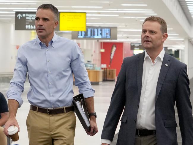 ADELAIDE, AUSTRALIA - NewsWire Photos FEBRUARY 11, 2025: SA Premier Peter Malinauskas (L),and Treasurer Stephen Mullighan on early morning flight to Whyalla, dealing with fallout from Whyalla Steelworks problems, and failure of Sanjeev GuptaÃs GFG to pay creditors. Picture: NewsWire / Dean Martin