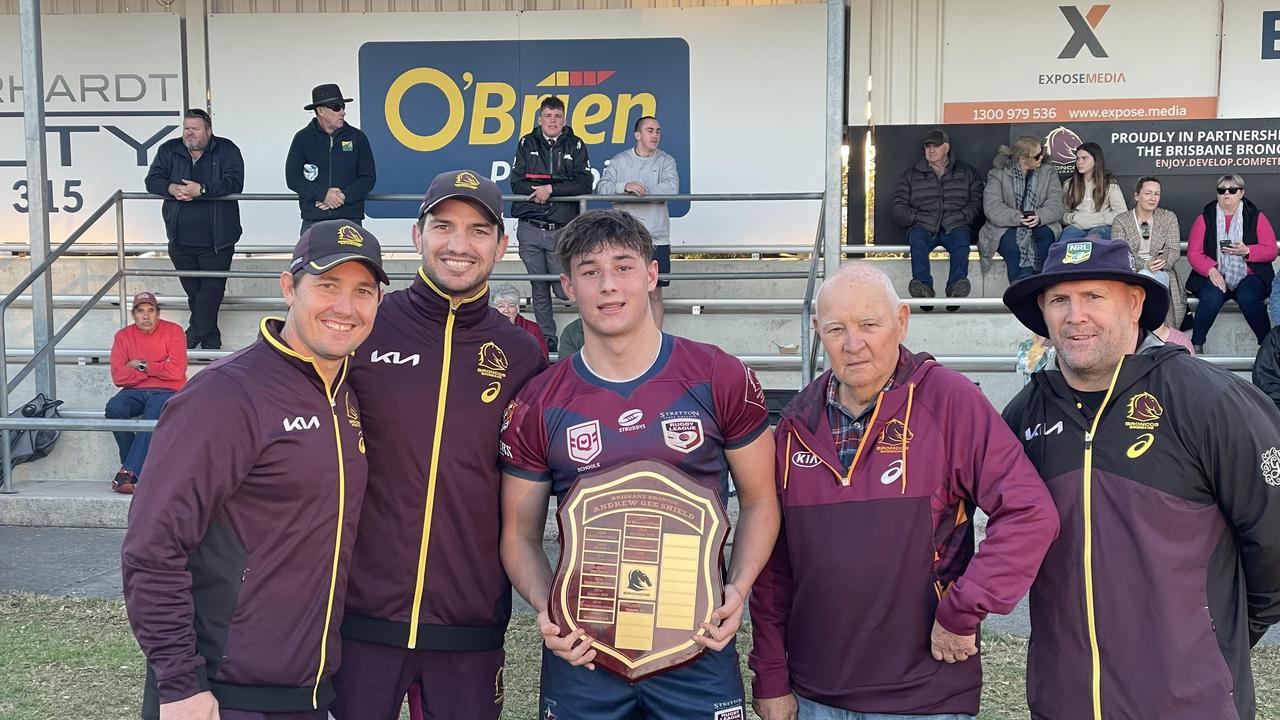 Stretton State College captain Jack McCosker with Broncos' Paul Dyer, Matt Gillet, Phil Hall and Mick Hancock.