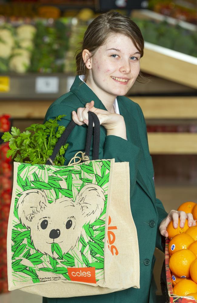 Windaroo Valley State High School student Alyssa Brooker with her koala-design on a Coles bag. Picture: Renae Droop/RDW Photography