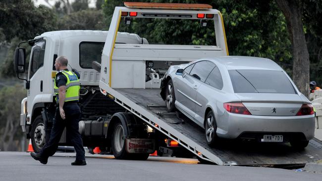 Police at the scene where Mitat Rasimi died on Dawn Avenue, Dandenong. Picture: Andrew Henshaw