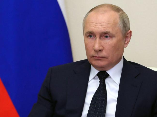 Russian President Vladimir Putin via video link, on March 23, 2022, says Russia will only accept payments in rubles for gas deliveries to “unfriendly countries”, which include all EU members, after Moscow was hit by unprecedented sanctions over Ukraine. (Photo by Mikhail KLIMENTYEV / SPUTNIK / AFP)